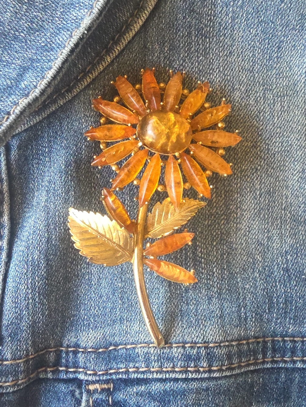 vintage mid-century sunflower brooch signed by Kramer Jewelry.